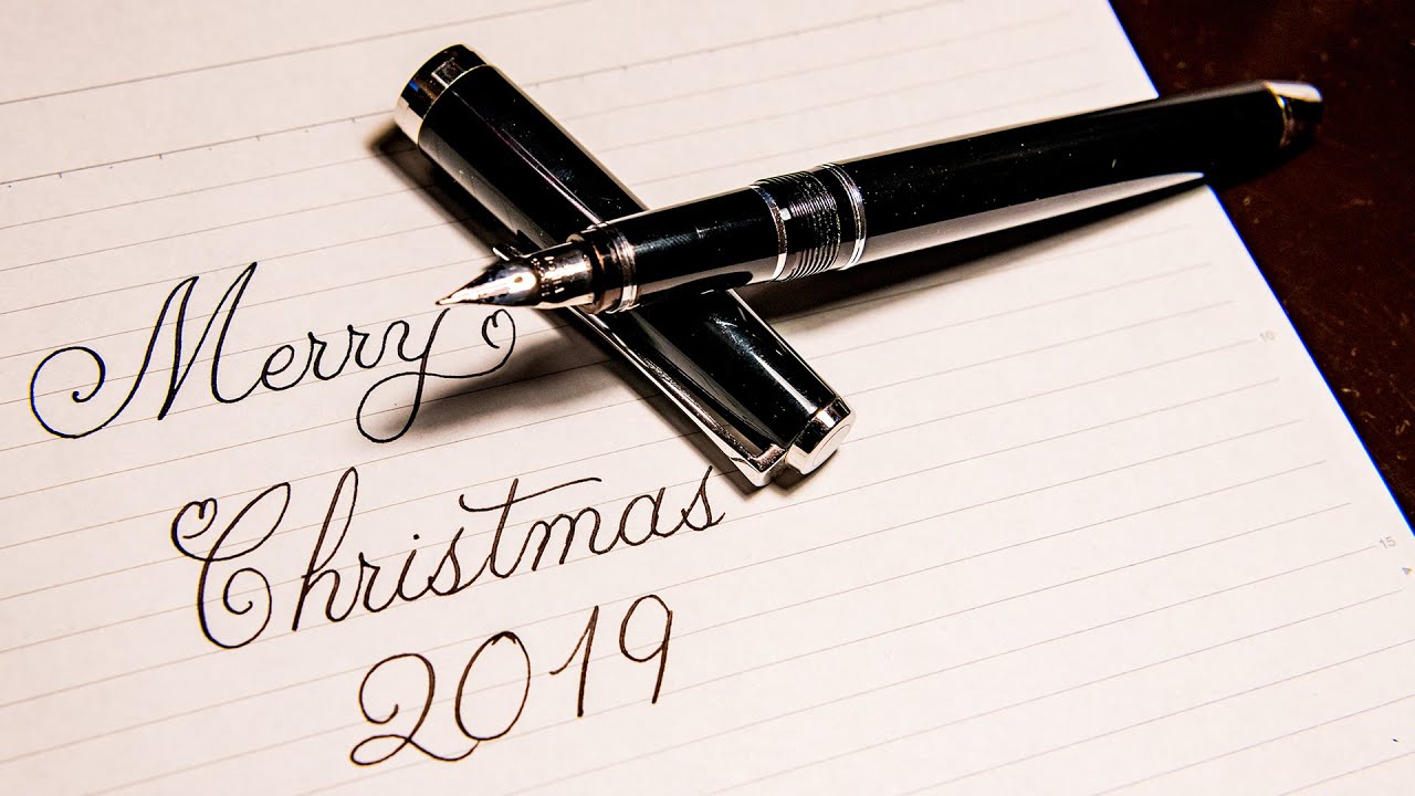 筆ペンで筆記体メリークリスマス Merry Christmas with Cursive