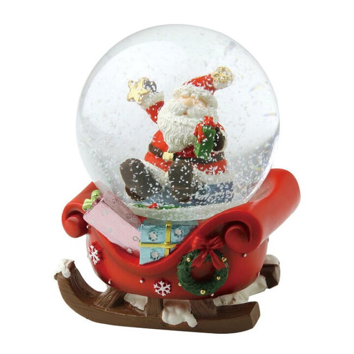 そりに乗ったサンタさん ソリに乗ったプレゼントを運ぶサンタさんと