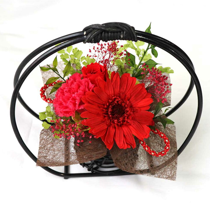 家族からの感謝の気持ちを込めて」お母様のお好きな紫色でおつくりした還暦お祝いのアレンジメント誕生日のおしゃれな祝い花