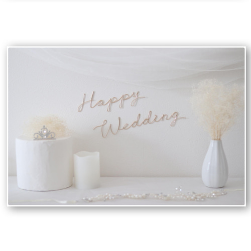 筆記体で書こう ”Weddingwedding” in cursive