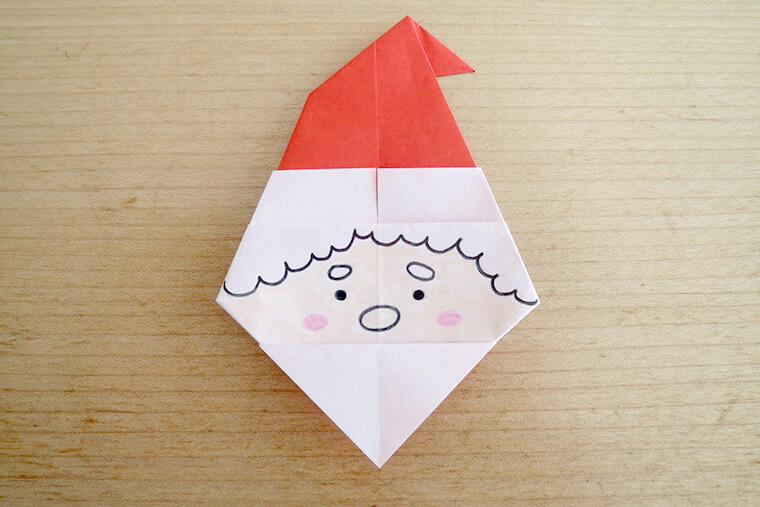 折り紙でサンタのかわいい 簡単な折り方。3歳の幼児でも作れます♪一枚でサンタクロースが完成！幼稚園や保育園の幼児の製作にも♪おりがみっこⅡ